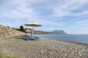 private beach with umbrellas